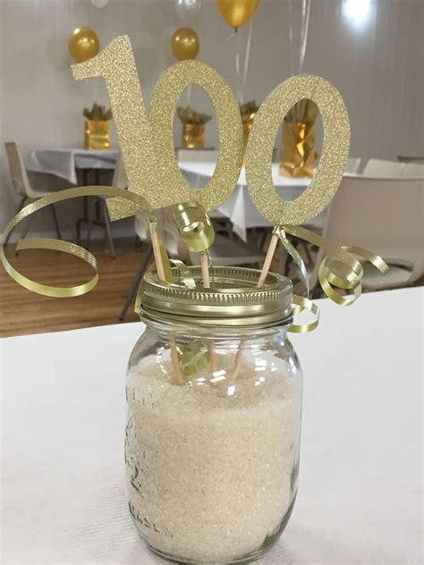 Mason jars filled with sugar and glittery numbers, ribbon, perfect ...