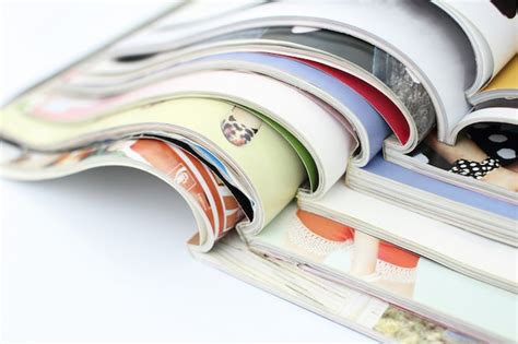 Premium Photo | Stack of magazines on white background