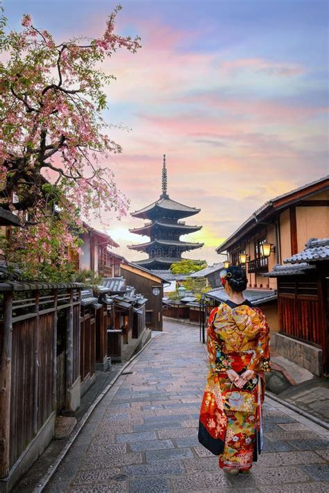 Young Japanese Woman in Traditional Kimono Dress with Yasaka Pagoda in ...