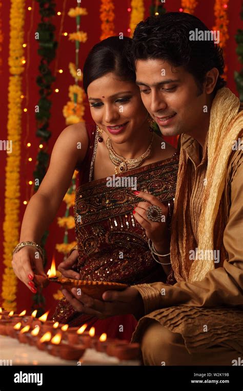 Couple celebrating Diwali Stock Photo - Alamy