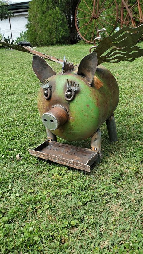 Flying pig bird feeder | Metal garden art, Recycled garden art, Garden art sculptures diy