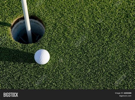 Golf Ball Near Hole Image & Photo (Free Trial) | Bigstock