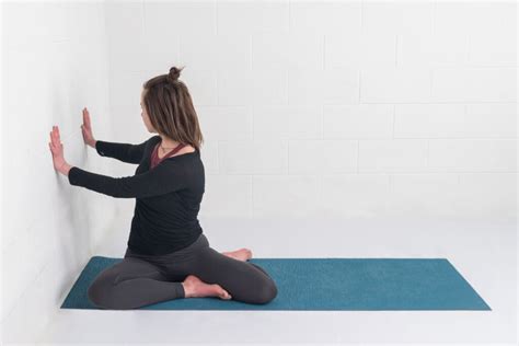 Mindful Twisting: Seated Spinal Twist Pose at the Wall - YogaUOnline