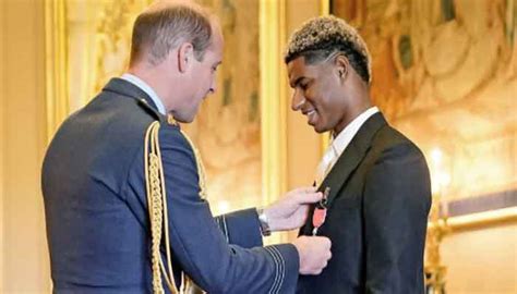 Manchester United forward Marcus Rashford receives MBE from Prince William