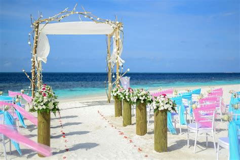 Beach Wedding Under Blue Sky · Free Stock Photo