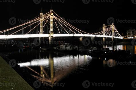 Albert Bridge by night in London 8035942 Stock Photo at Vecteezy