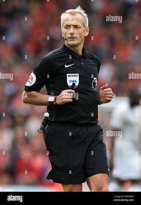 Referee Martin Atkinson during the Premier League match at Anfield, Liverpool. PRESS ASSOCIATION ...