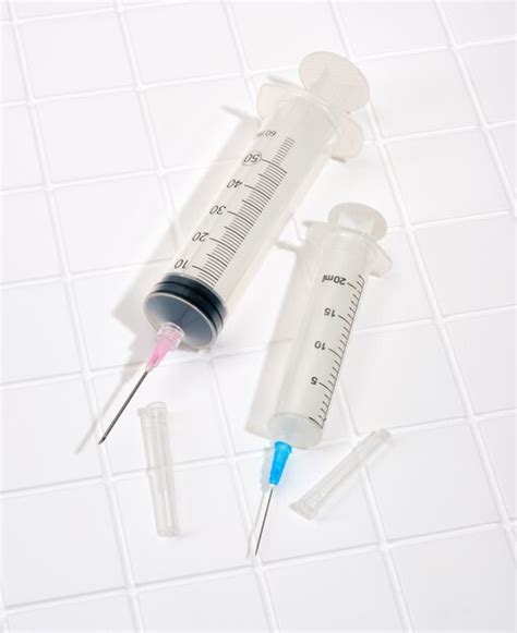 Premium Photo | Medical syringes of different sizes health support