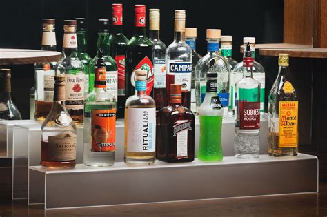 4 Ways Liquor Bottle Shelves Improve Your Home Bar