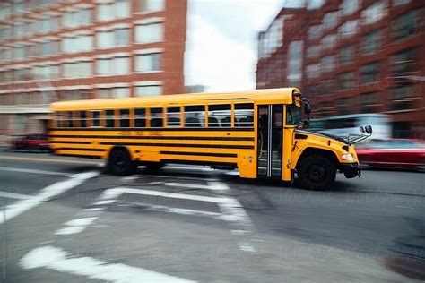 "School Bus Speeding In Boston" by Stocksy Contributor "Vero." - Stocksy