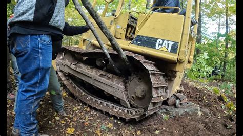 Fixing a dozer track - YouTube