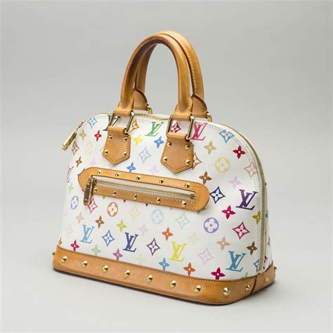 A LOUIS VUITTON ALMA BAG. - Bukowskis