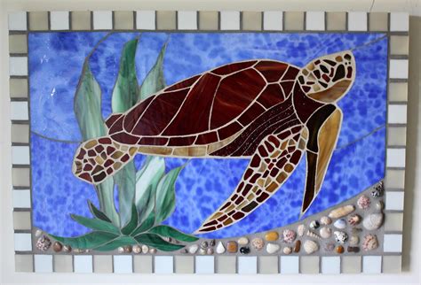 A brown, loggerhead sea turtle mosaic in stained glass....enjoy ...