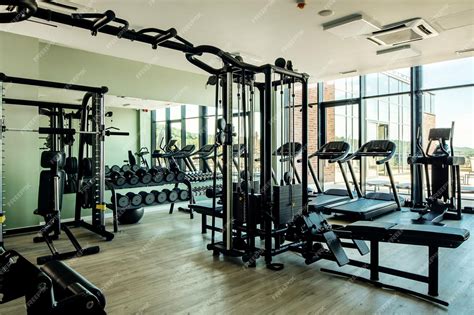 Premium Photo | Exercise equipment at empty gym