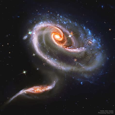 APOD: 2019 November 20 - Arp 273: Battling Galaxies from Hubble