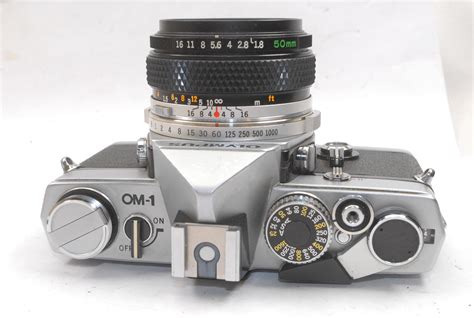 Olympus OM-1, chrome, with 50mm f1.8 Zuiko Auto-S lens