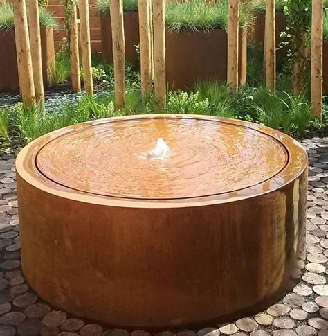 corten steel modern water feature for modern garden deisgn