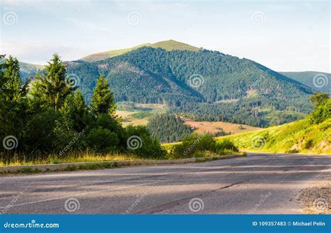 Road in To the Mountains through Forest Stock Image - Image of country, nature: 109357483