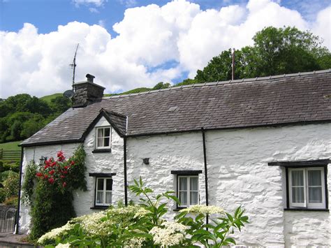 Wales Cottages | Traditional Welsh Cottage in Snowdonia Wales ~ they look even better with a few ...