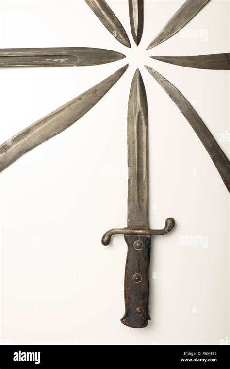 Isolated dagger with assorted blades of weapons Stock Photo - Alamy