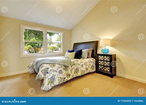 Bedroom Interior with Beige Walls and Nice Bedding Stock Photo - Image ...