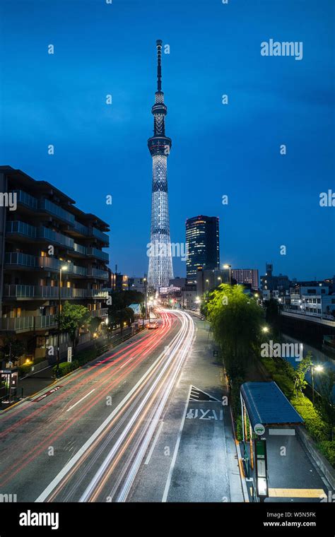 View of Tokyo Skytree tower with light trail Stock Photo - Alamy