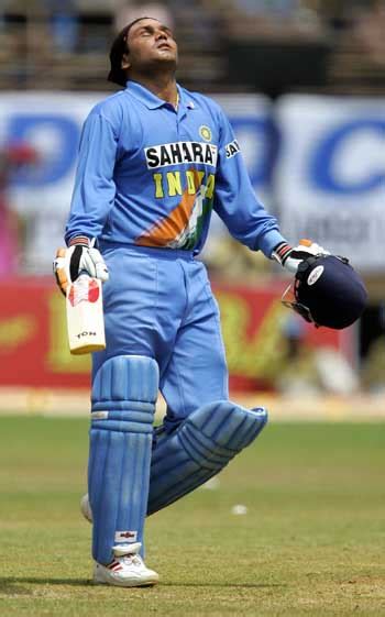 Virender Sehwag scored a magnificent century in debilitating conditions ...