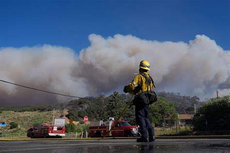 Wildfire erupts burning more than 11,000 acres near Los Angeles, mass ...