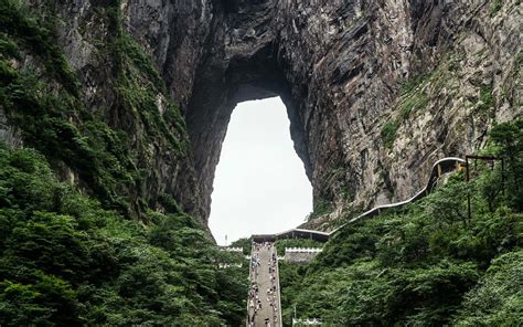 China Heaven Gate is an unbelievable cave natural arch eroded through the karst syncline ...