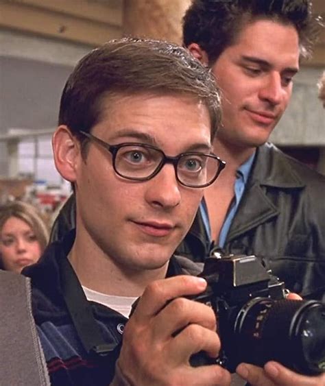 In Spider-Man (2002), Peter Parker takes pictures of his classmates during a field trip to a ...