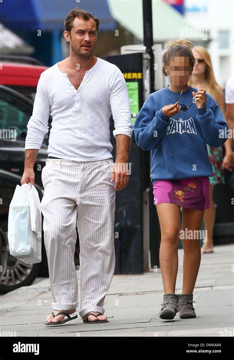 Jude Law with his daughter Iris and son Rudy walking through Primrose ...