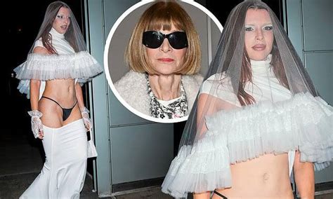 Julia Fox wears a BIZARRE wedding-like outfit with low-riding skirt and g-string in latest ...