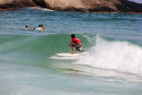 Surfing Boy at Arpoador Beach in Rio De Janeiro Editorial Photo - Image of wave, brazil: 78093541