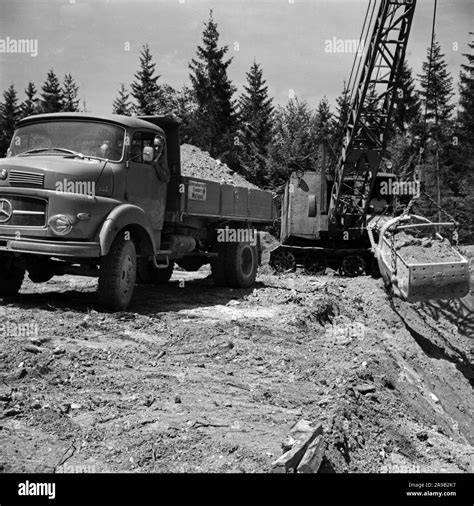Daily work in a construction area, Germany 1950s Stock Photo - Alamy