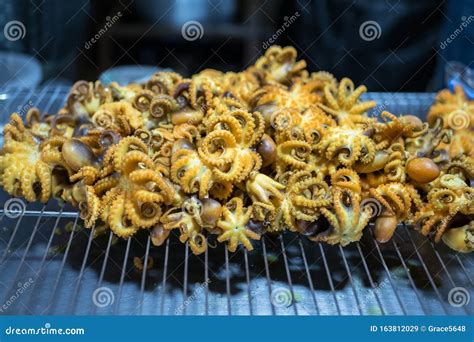 View of the Fried Octopus As Snack Street Food in Bangkok,Thailand ...