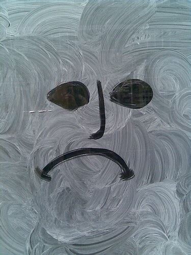 Sad face on shop window in Cambridge | Chris Gilson | Flickr