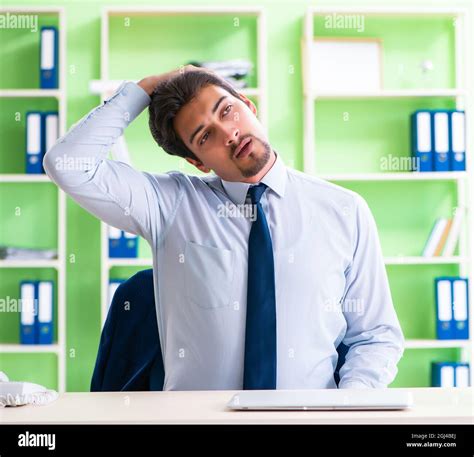 The employee doing exercises during break at work Stock Photo - Alamy