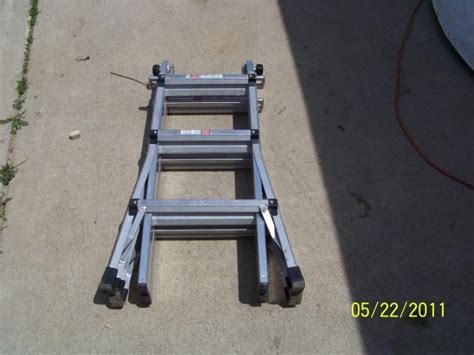 Ladder Storage Rack Under Camper with pics - Sunline Coach Owner's Club