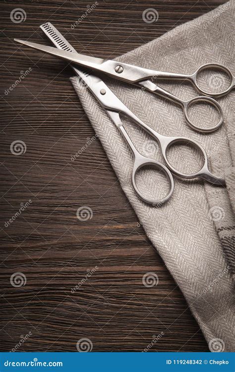 Hairdressing Scissors on a Black Wood Background. Stock Photo - Image of grey, haircut: 119248342