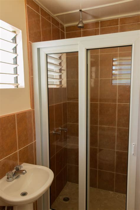 Welcome to Travellers Beach Resort, Negril Jamaica | Bungalow bathroom ...