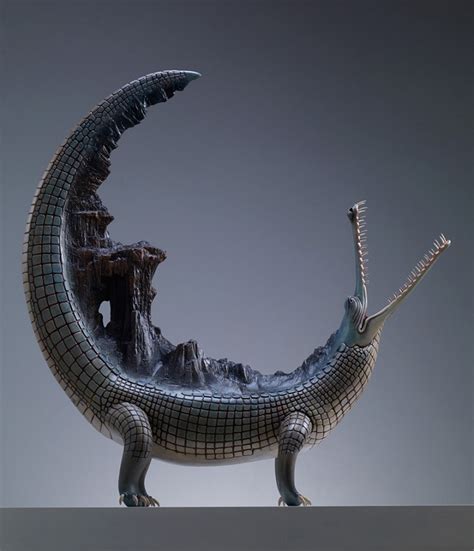 Surreal Sculptures of Animals Carrying the Weight of the World on Their Backs