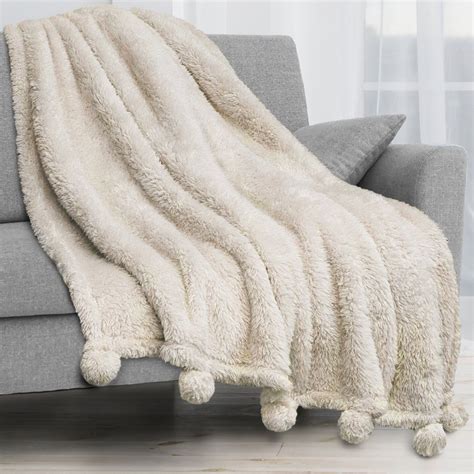 PAVILIA Ivory Cream Sherpa Throw Blanket with Soft Pom Pom Fringe ...