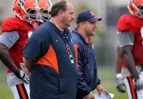 Syracuse University football line coaches work in tandem to get their ...