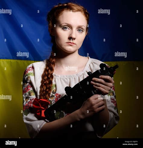 Ukrainian girl with a machine gun Stock Photo - Alamy