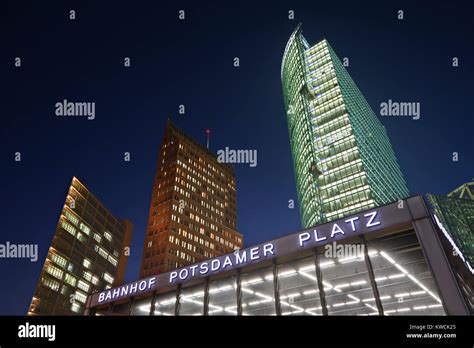 Potsdamer Platz train station entrance and skyscrapers at night Stock ...