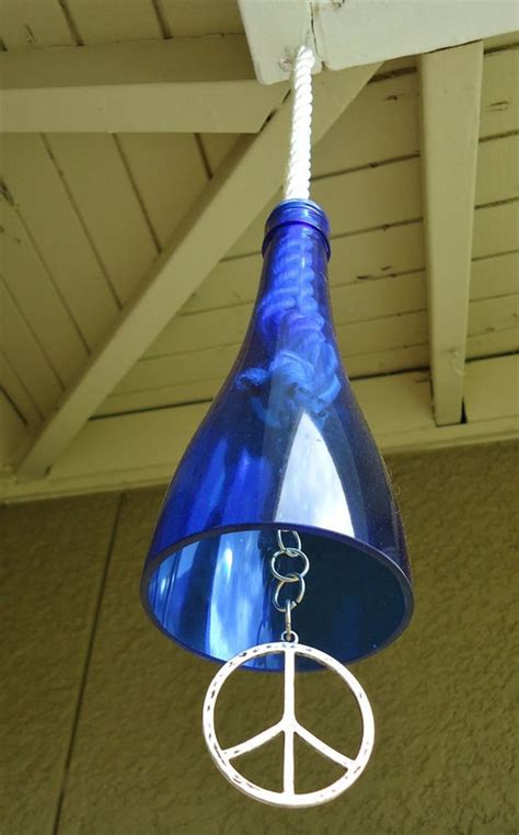 Wind-Chime-Out-of-Recycled-Wine-Bottles.jpg (750×1207) | Wine bottle wind chimes, Recycled wine ...
