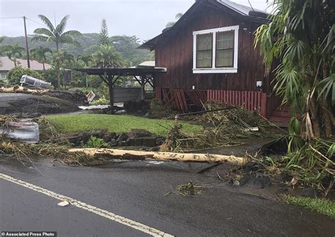 Rain continues to pound Hawaii as the once-powerful Hurricane Lane is ...