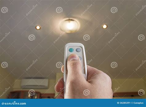 Remote Control Controlling an Light Stock Image - Image of hand, wireless: 36285391