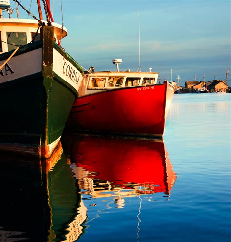 robertmanz.net: fishing boats at sunset