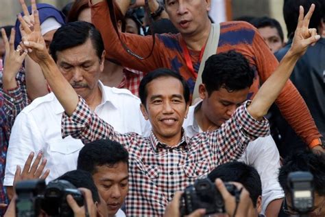 Indonesia election: presidential candidates both claim victory | CBC News